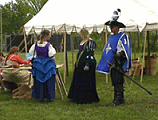 Some attendees look over one of the encampments... double click to see larger version in JPEG format