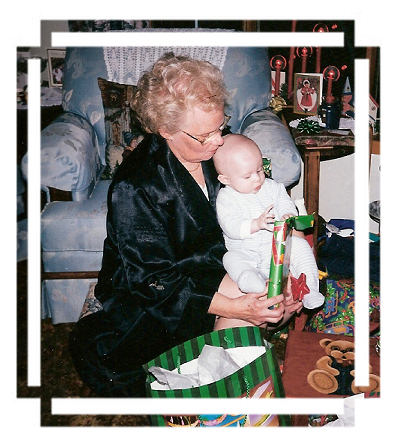  Nanny and Riley opening gifts.