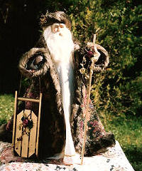 Santa with Tapestry Coat and Sleigh