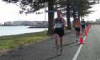 Chris Speakman leads Des Young and Chris Martin along Hardinge Rd