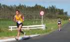 Darryl Strachan leads Graeme Butcher back onto Te Awa Ave