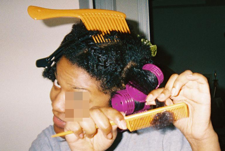 I comb the product through the hair to ensure good coverage and to ensure hair is thoroughly detangled before rolling