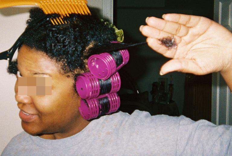 Hair seems ready for rolling now. I fully stretch the hair so that it will going on the roller smoothly