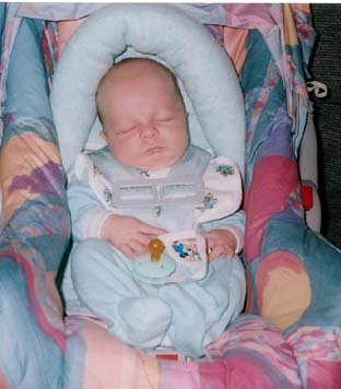 John sleeping as a baby