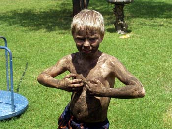 John playing in the mud