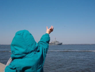 Waving goodbye to daddy...
