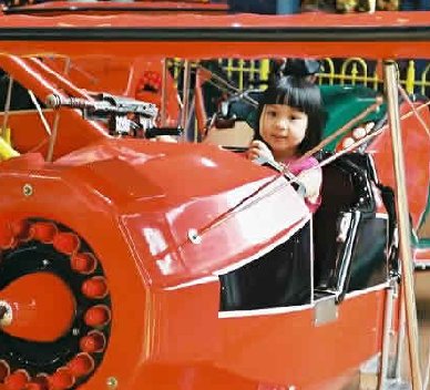 cassandra enjoyed her trip on a super great plane...[6 years old]