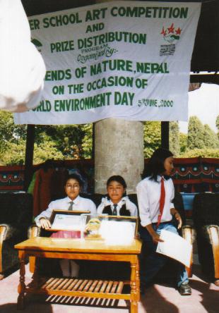 Winning Students posing for Picture with their Prizes