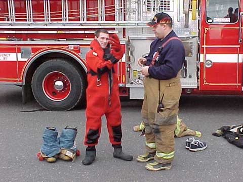 Bill helping Jim put the dry suit on