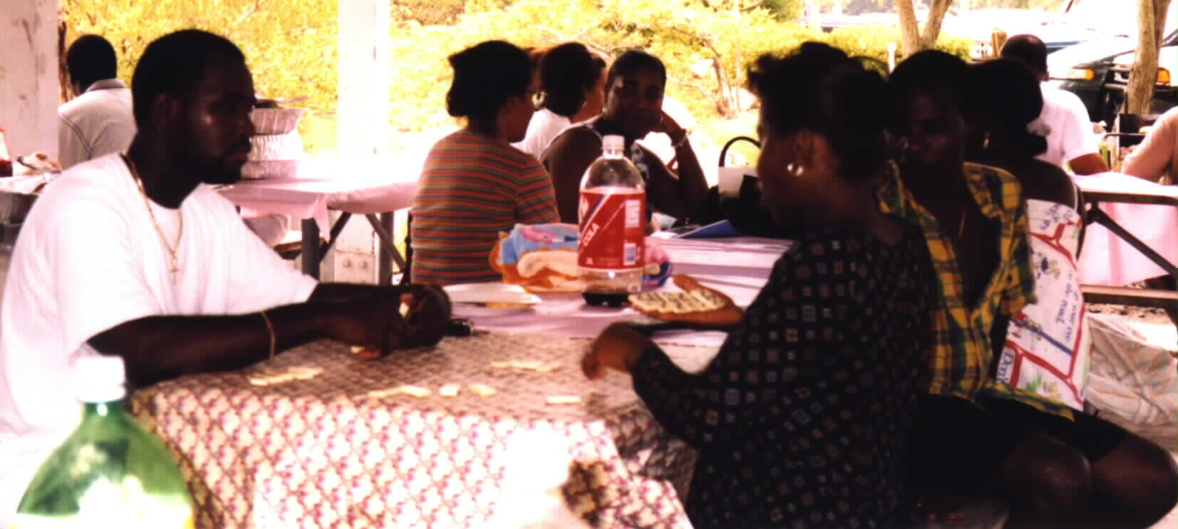 Participants playing domino a great Haitian pass time.(Picture by Noe Dorestant. Give credit where credit is due)