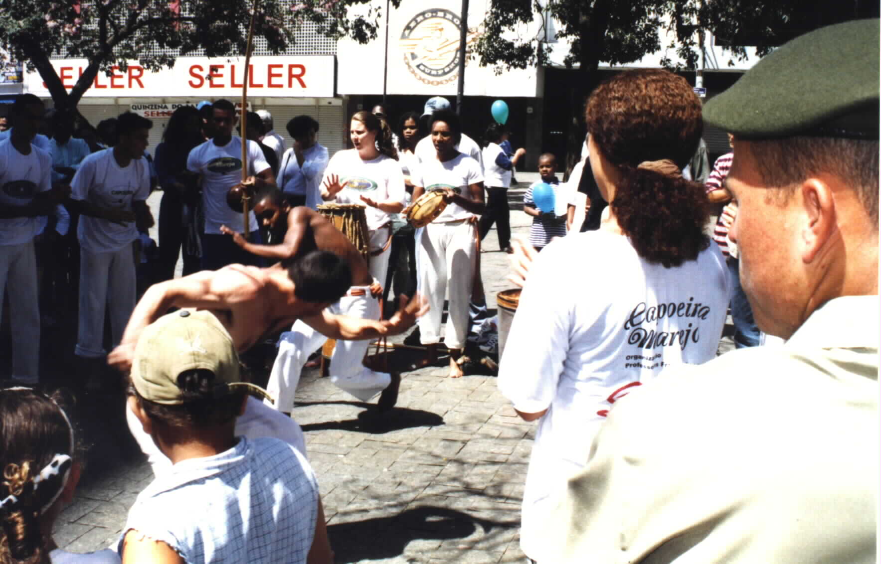 (Picture courtesy of Noe Dorestant:Brazilian of all shades practicing the old African Brazilian music dance and self-defense.)Picture photographed and provided by
Noe Dorestant give credit where credit is due. 