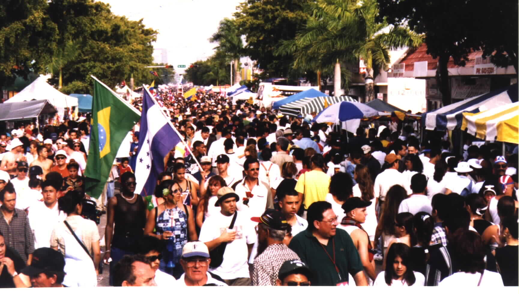 (Rainbow of people in Calle Ocho)Picture photographed and provided as a courtesy by  Noe Dorestant, if Noe Dorestant, if you copy for reuse, give credit where credit
is due. 