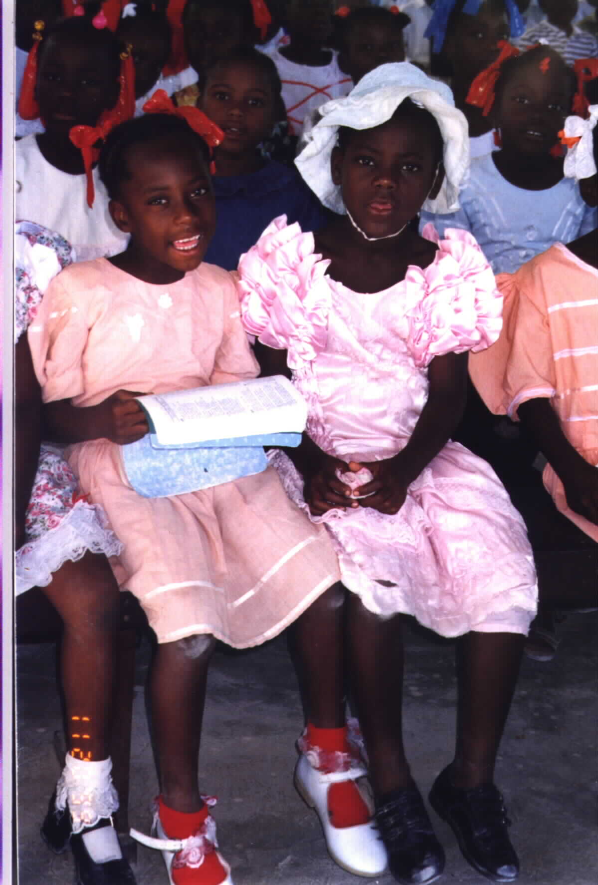 
(Haitian children singing in Village of hope Sunday School)Picture photographed Noe Dorestant. If you copy for reuse, give credit where credit is due. 