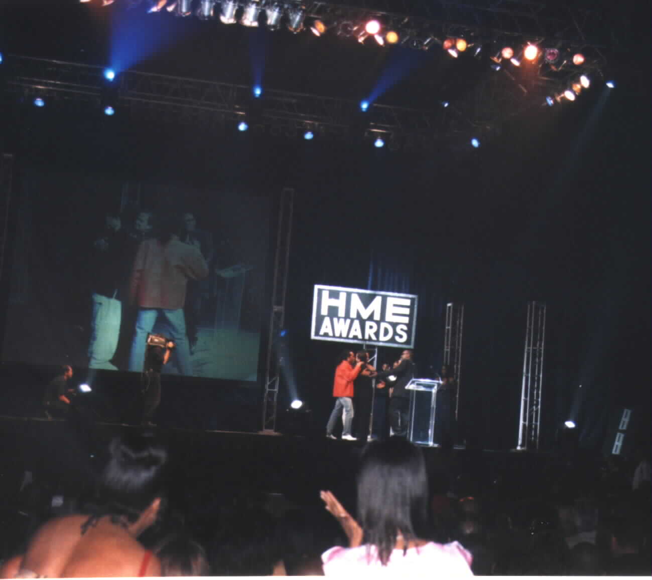 (Picture photographed by Noe Dorestant 3/31/2002:The audience on the main floor and award winners on stage )
give credit where credit is due. 