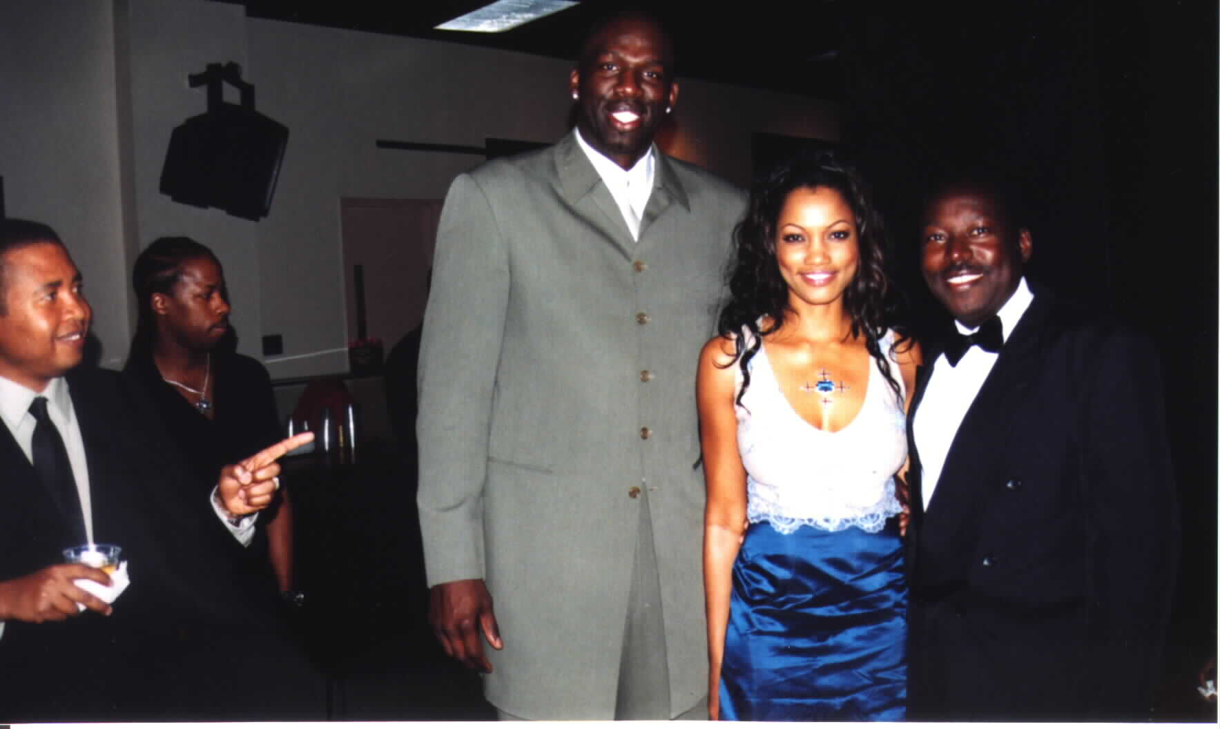 (Picture courtesy Noe Dorestant 3/31/2002: Haitian star actress Garcelle Beauvais, Olden Polynice, Noe Dorestant, WLL and fan. 
Give credit where credit is due. 