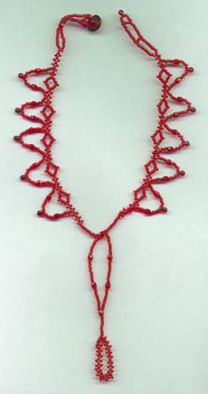 [photo of red anklet]