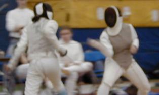 Anne Marie Chokanteril of Tufts fencing Kate Thomas of Smith