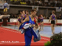 Carrying his bag out . . .