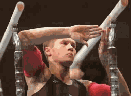 Preparing the parallel bars . . . (a bit blurry)