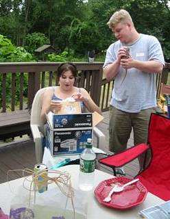Christmas in July! Melody & Steve opening their Gift Exchange gift.