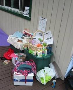 Kim's Ark's little fundraiser booth and raffle basket. Lots of goodies to benefit the rescue ratties.