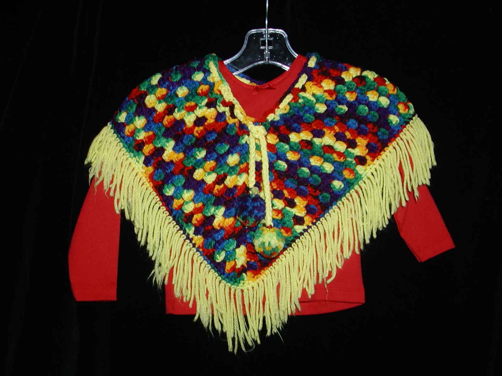 Hand-woven ponchos for little ninas