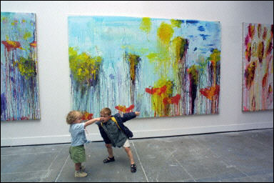 Children discuss the paintings of US artist Cy Twombly. Australia's Art Gallery of New South Wales has spent millions of dollars on its most expensive acquisition ever, an abstract by US artist Cy Twombly, which the gallery admitted looks like it could have been painted by a child(AFP/File/Gabriel Bouys)