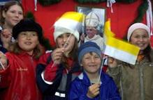 Children wave flags in the German Bavarian town of Marktl, the birthplace of the newly elected Pope, at the Bavarian lake Inn, 90 kilometres east of Munich on April 19, 2005. Cardinals on Tuesday  elected conservative German prelate Joseph Ratzinger as the new  leader of the world's 1.1 billion Roman Catholics, in a controversial choice to succeed Pope John Paul II. Ratzinger, 78, the Church's 265th pontiff, will take the name of Benedict XVI.  Picture taken April 19, 2005.     REUTERS/Stringer