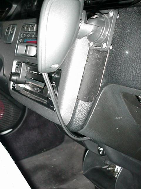 Photo: Bracket sticking out from under bezel, Honda Civic (92 93 94 95)