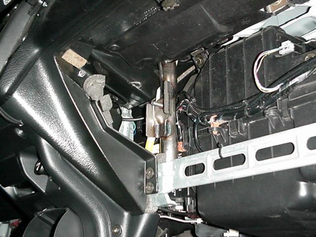 Photo: Bracket sticking out from under bezel, Honda Civic (92 93 94 95)