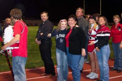 Chemel and family before the game being introduced as a member of the homecoming court. 