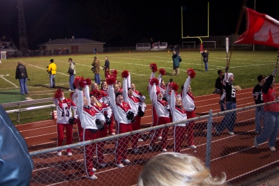 We've just scored!&nbsp; The cheerleaders & oarsman are celebrating a touchdown. 