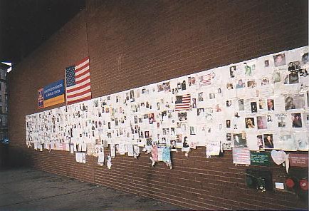 This is one of many walls where family and friends of the missing have posted pictures