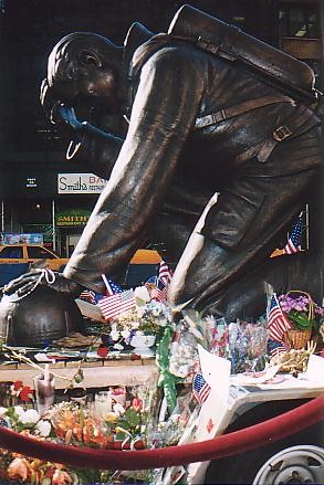 This is a statue of a firefighter mopurning the loss of his brothers and sisters in the fire service.