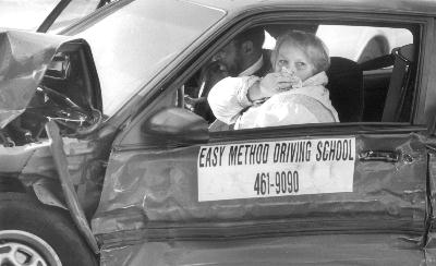 She looks a little bit old for Driving School