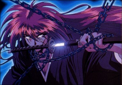 His arm is wrapped in a chain...looking so cool kenshin ^_^
