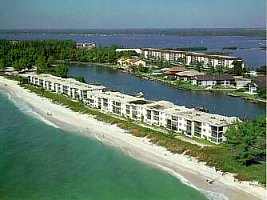 near middle of the white building on the beach