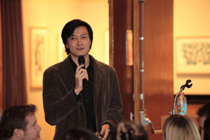 A photo of our keynote speaker Jorge Cham.  Jorge writes a comic strip called Piled Higher and Deeper.  Photo courtesy of Nick Peyton, taken on November 18, 2006 in the Burke Museum.