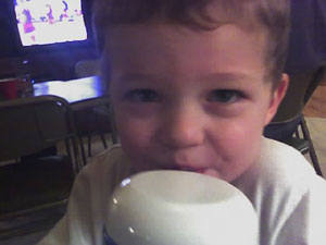 A photo Kellen drinking his juice.  Photo taken on March 3, 2007.