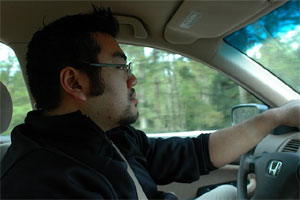 Photo of me driving in my Honda on the way to Cape Alava.  Photo taken on April 27, 2007 and courtesy of Kelli Larsen.