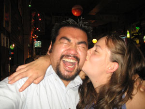 My coworker Shannon is giving me a kiss.  After working in the trenches with her, I will miss our bantering.  Photo taken on July 13, 2007.