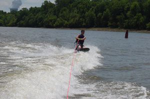 A photo Jessica, a fellow board member, knee boarding on the Ohio River on July 23, 2006.  Photo by Nick Peyton.