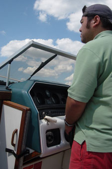 A photo of myself sailing the boat on the Ohio River on July 23, 2006.  Photo courtesy of Nick Peyton.