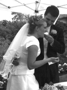 Photo of Brian and Traci eating cake on August 20, 2005 at Traci's house in Orem, UT. Photo courtesy of Nick Peyton.