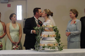 A good looking kiss after cake. Photo by Nick Peyton, taken August 8, 2006.