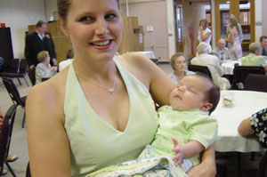 A photo of Anna and her two-month old son Miles.  When did little Anna have time for children?  Photo by Nick Peyton, taken August 8, 2006.
