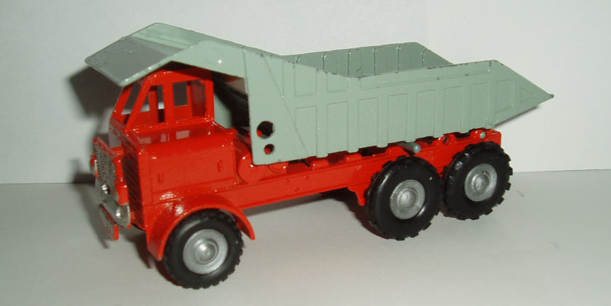 Rarity 1. 226 Foden Dumper. 1959-66. This is a reissue of a Morestone model. The main differences are the number plates BUD123, the reddish colour, the silver hubs and the strengthening lats to the inner dump sides.
