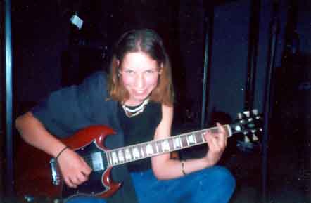 happy girl with Randy's guitar