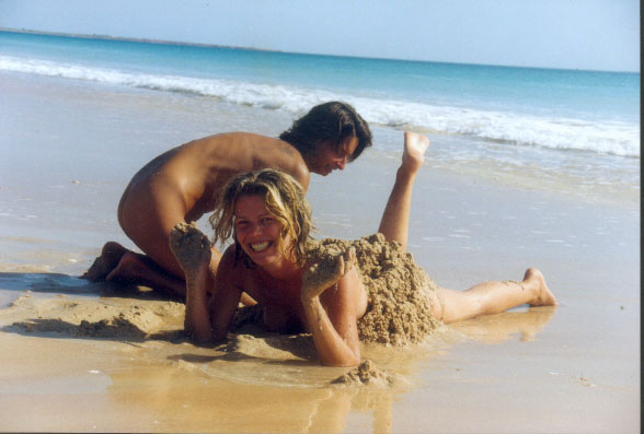 build a nude sandcastle on someone's bum