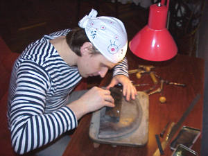 The process of engraving into slate
